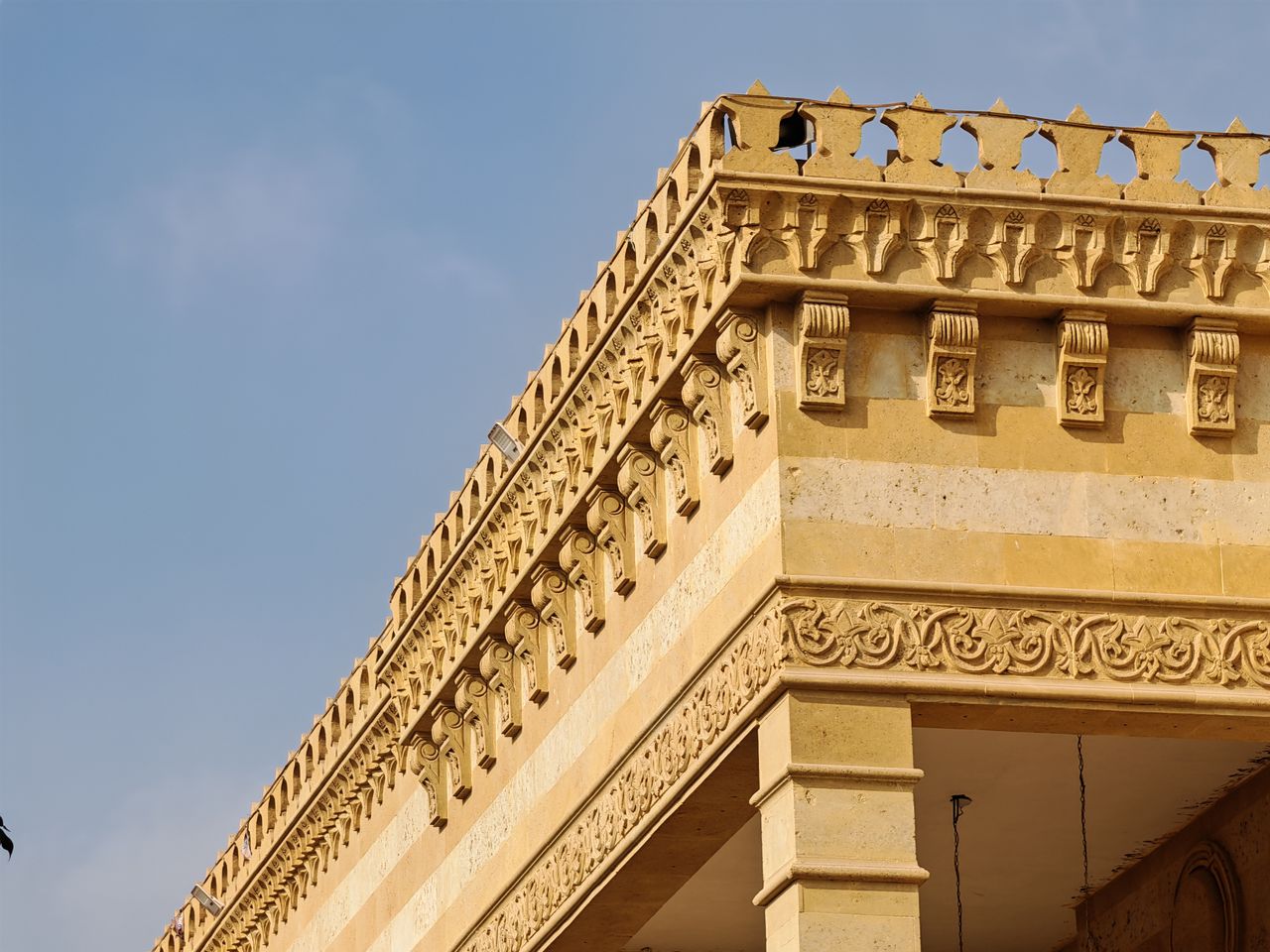 Close-up of intricate architectural details on a historic building's exterior.